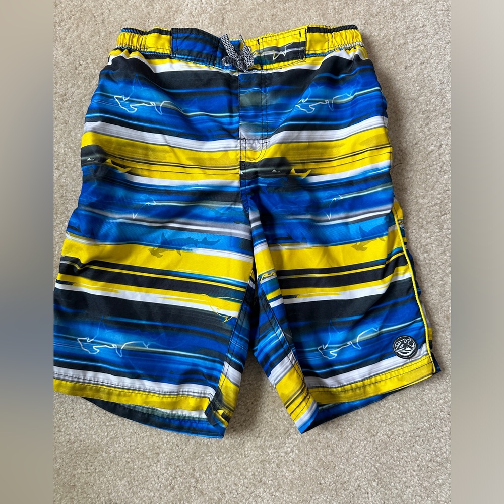 Zero Xposur youth swim trunks. Size extra large. Great condition.